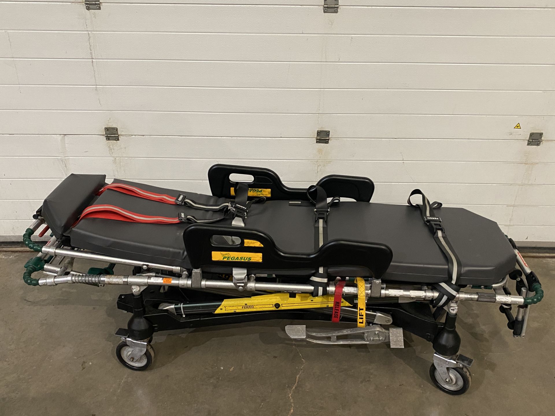 A Ferno Care Pegasus ambulance trolley with standard 2 part Trolley Lock and bolts - Image 2 of 7