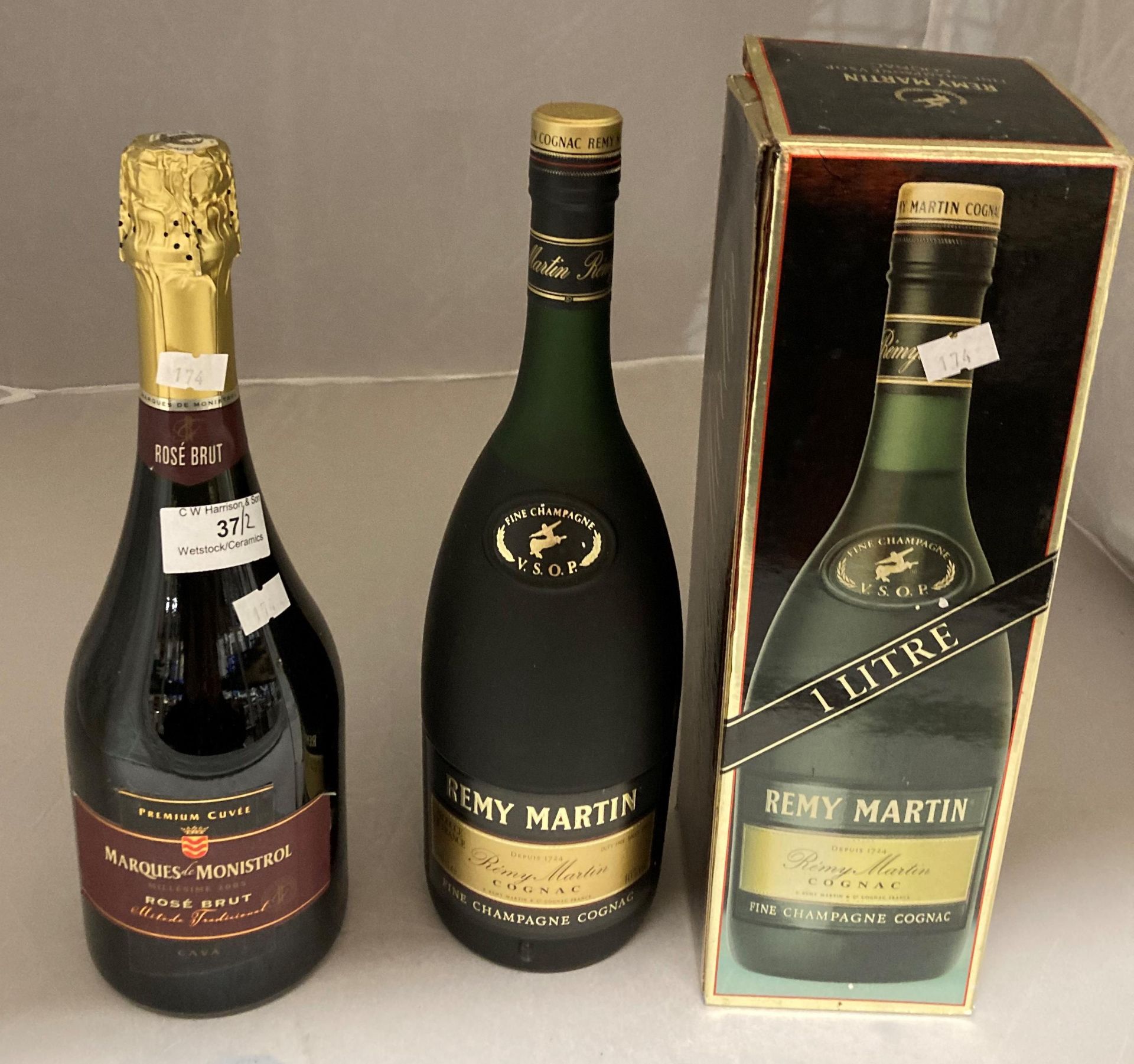 A 100cl bottle of Remy Martin Fine Champagne Cognac in presentation box and a 750ml Marques de