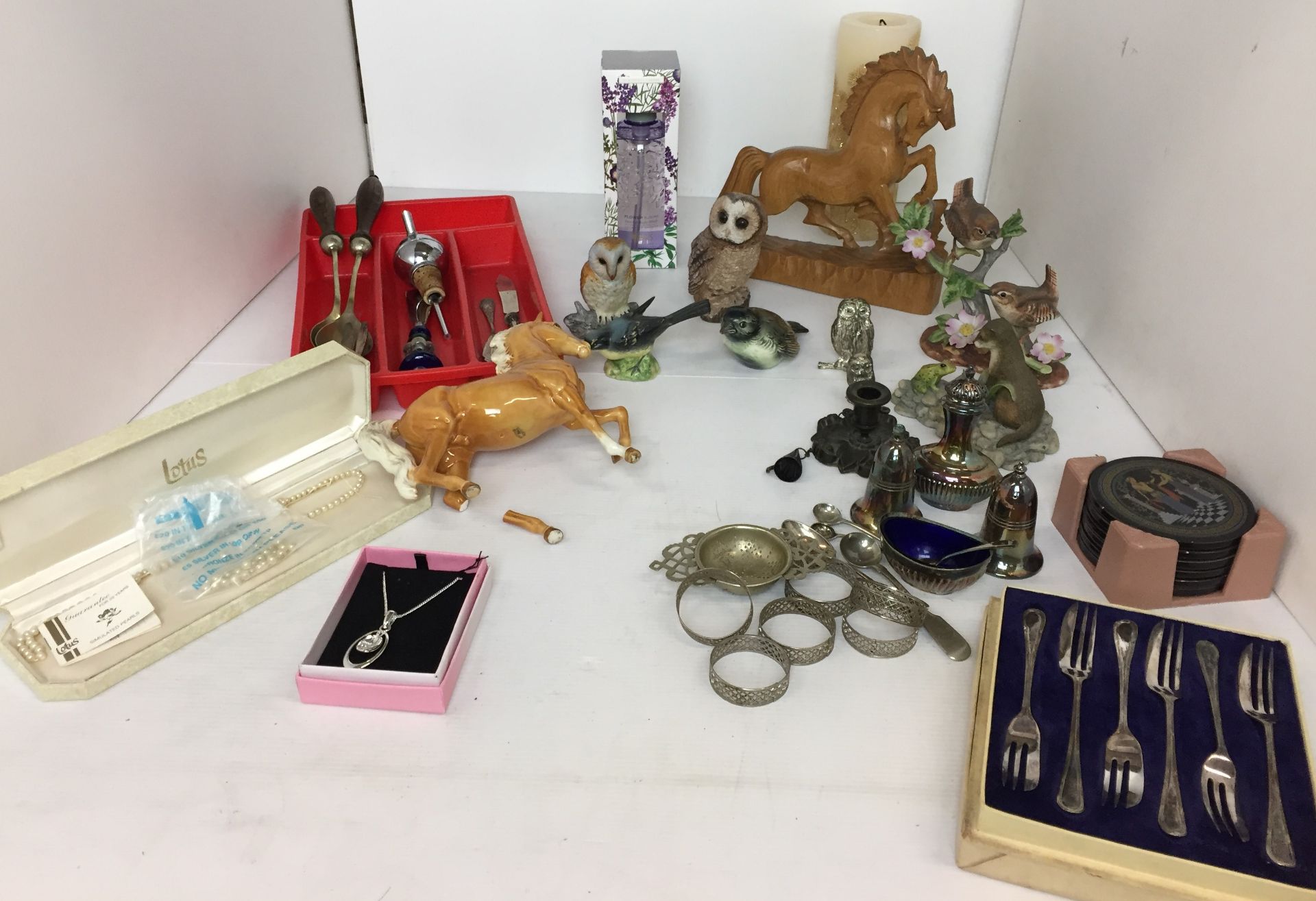 Thirty plus items including Beswick blue tit and palomino prancing horse (damaged),