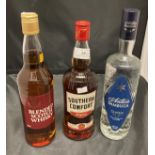 Three various bottles - 70cl Southern Comfort 35% volume,