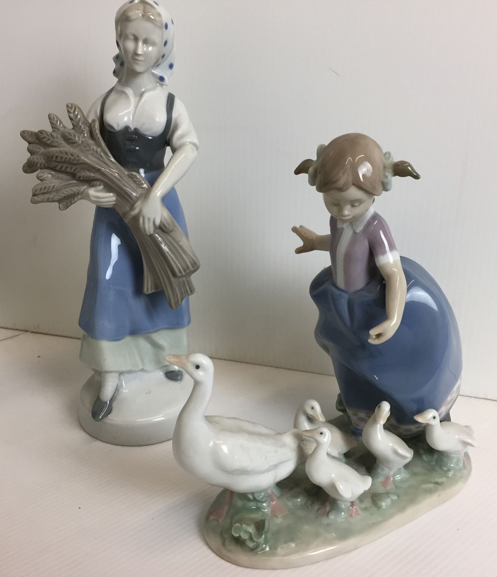 Four Lladro figures - two girls with kittens 24 and 21cm high, - Image 5 of 6