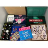 Two boxes containing six games - Carpet Bowls, Picasso, Scrabble,