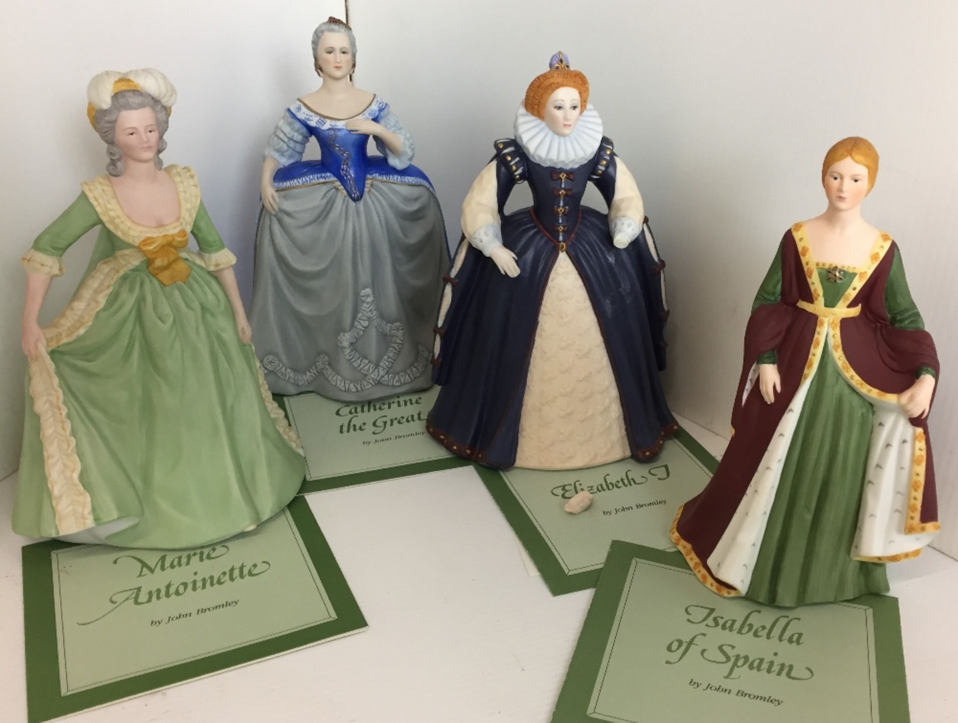 Four Franklin Porcelain historic figurines 20 and 21cm high - Elizabeth 1st (left hand detached)