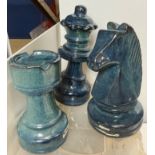 Plastic box containing three blue giant ceramic chess pieces 38cm high maximum (saleroom location: