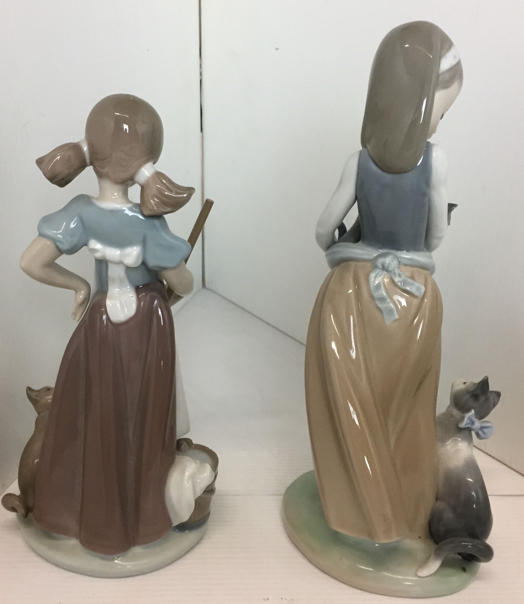 Four Lladro figures - two girls with kittens 24 and 21cm high, - Image 3 of 6