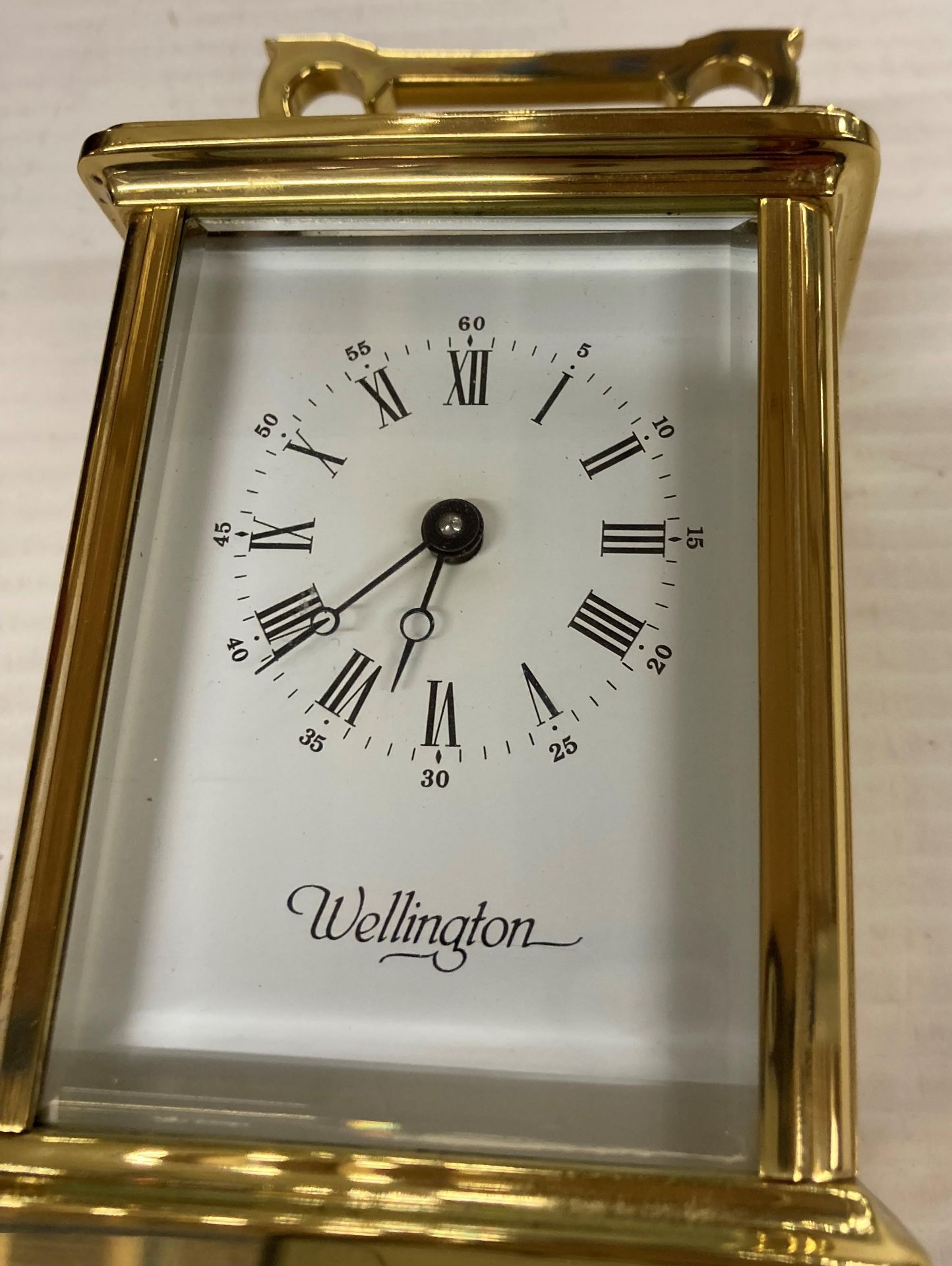 A Wellington brass cased carriage clock including key 15cm high, - Image 2 of 3