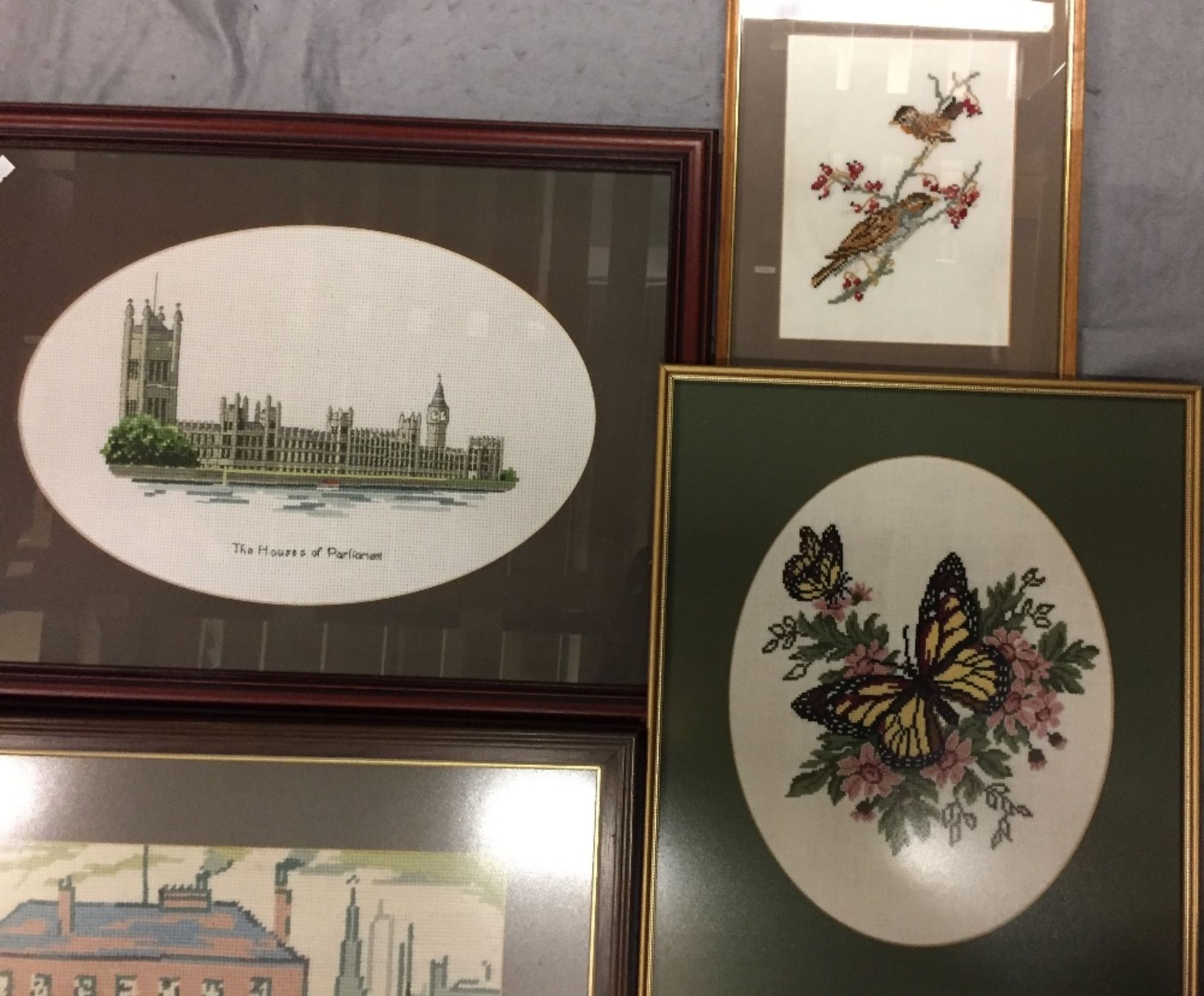 Box containing seven framed pictures - six needlepoint - one in the style of L S Lowry market - Image 4 of 5