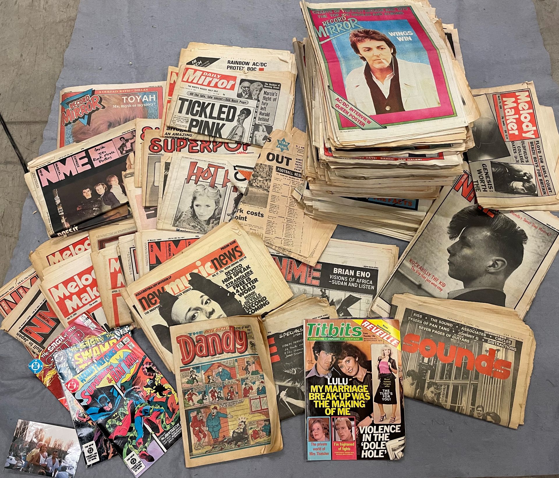 Green plastic box and contents - magazines, comics and newspapers from the 1970s and 80s - NME,