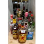Twenty-three part bottles of spirits and liqueurs including Gordon's and Whitley Neill flavoured