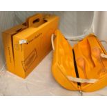 A Veuve Clicquot Champagne case containing two champagne glasses,