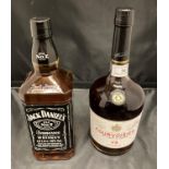 A one litre bottle of Courvoisier Cognac 40% volume and a one litre bottle of Jack Daniels Old No 7