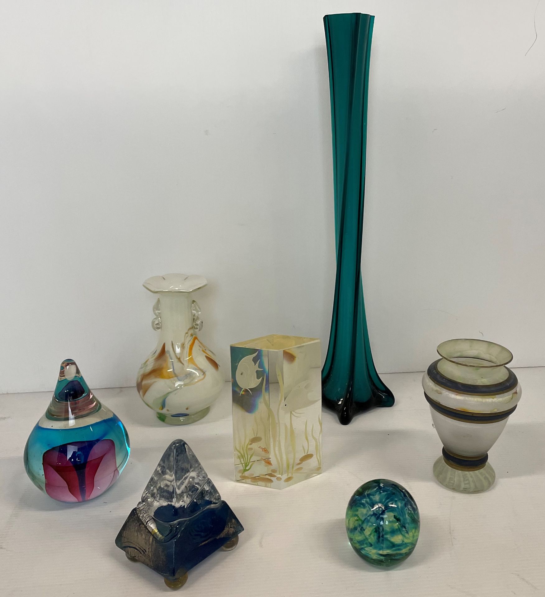 Seven pieces of glassware including three paperweights, turquoise vase 40cm high,