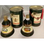 Two Wade porcelain decanters containing 75cl Bells Old Scotch Whisky 40% volume in presentation