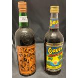 A bottle of Adams Old Rich Tawny Old Monk Port Lodge 5 and a bottle of 70% proof Coruba Jamaican