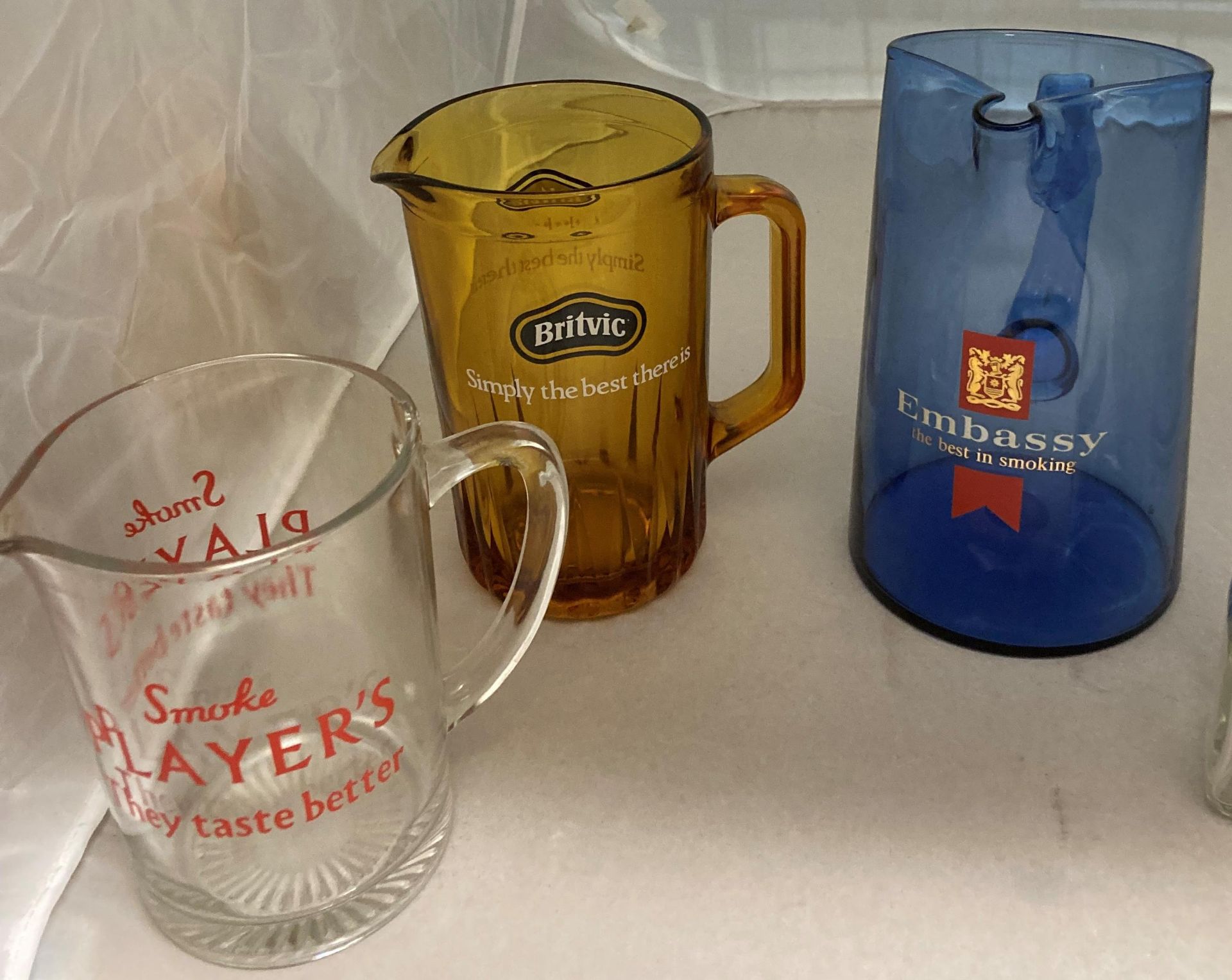 Five glass and one plastic advertising water jugs - Nelson Tipped Cigarettes, Embassy, Player's, - Image 3 of 3