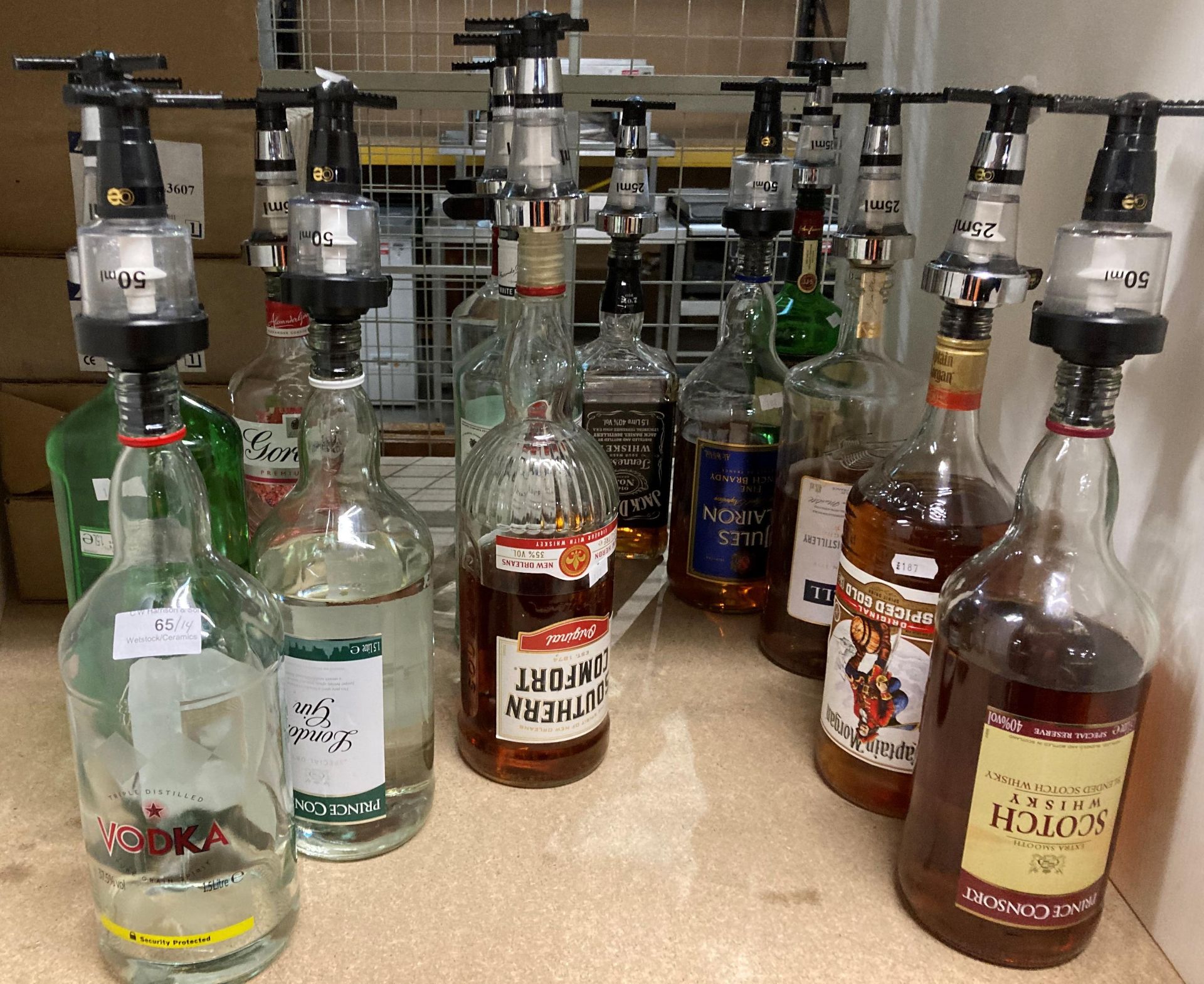 Fourteen part bottles of spirits and liqueurs (all with fitted measures - ten half full and four