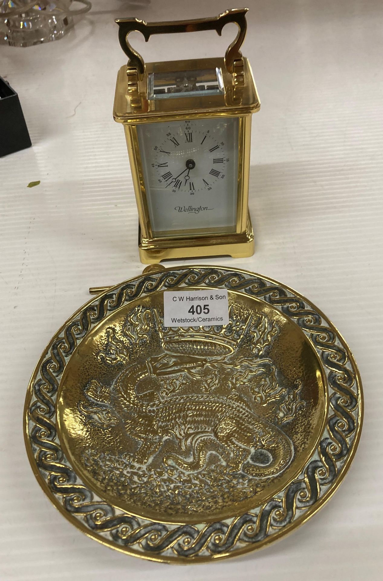 A Wellington brass cased carriage clock including key 15cm high,