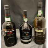 Three various bottles of port - Cockburn's Special Reserve Port,