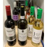 Nine bottles of various wines (five white, three reds, one rosé including Chardonnay, Malbec,