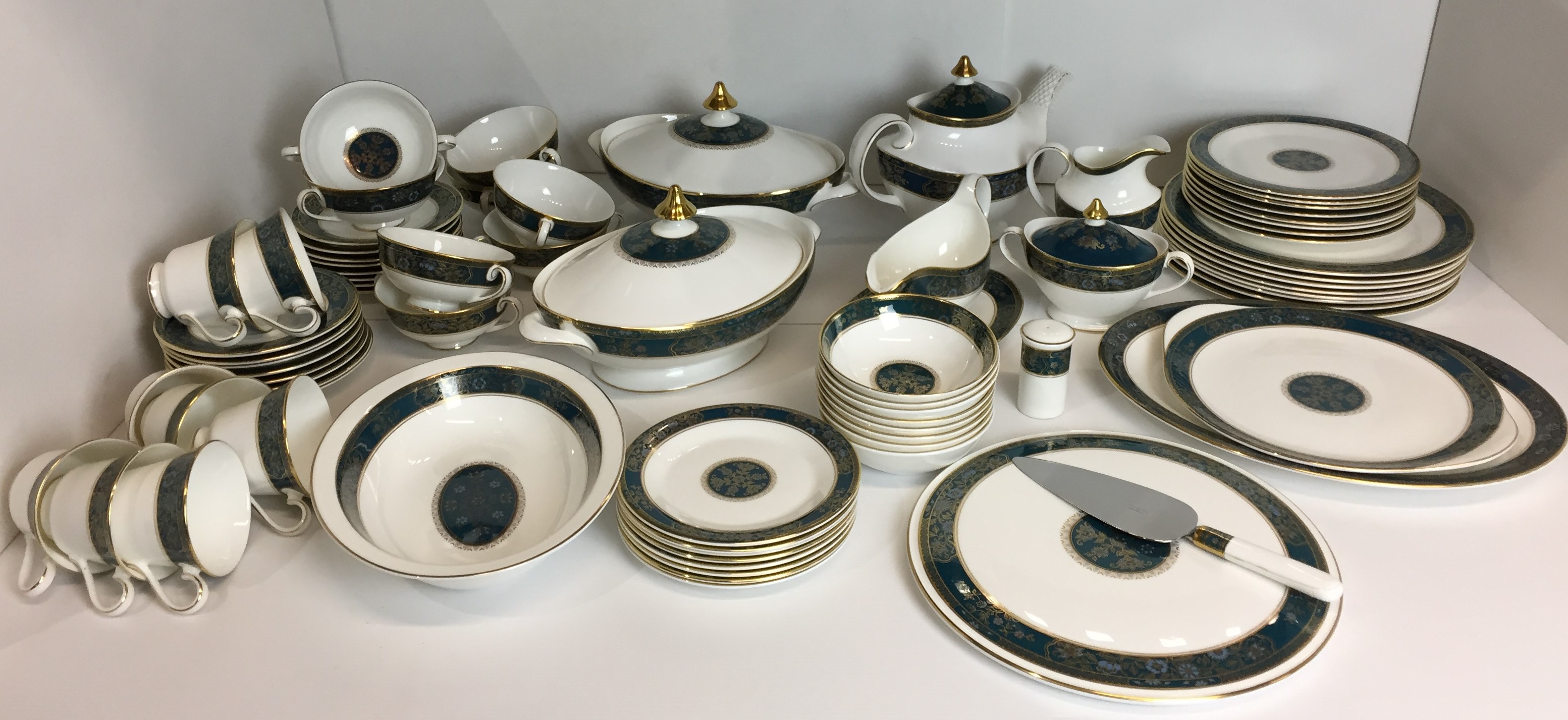 Seventy seven pieces of Royal Doulton Carlyle dinner/tea service in blue,