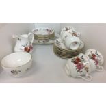 Twenty three pieces of Royal Albert China Garden New Romance bone china tea service (chip to base
