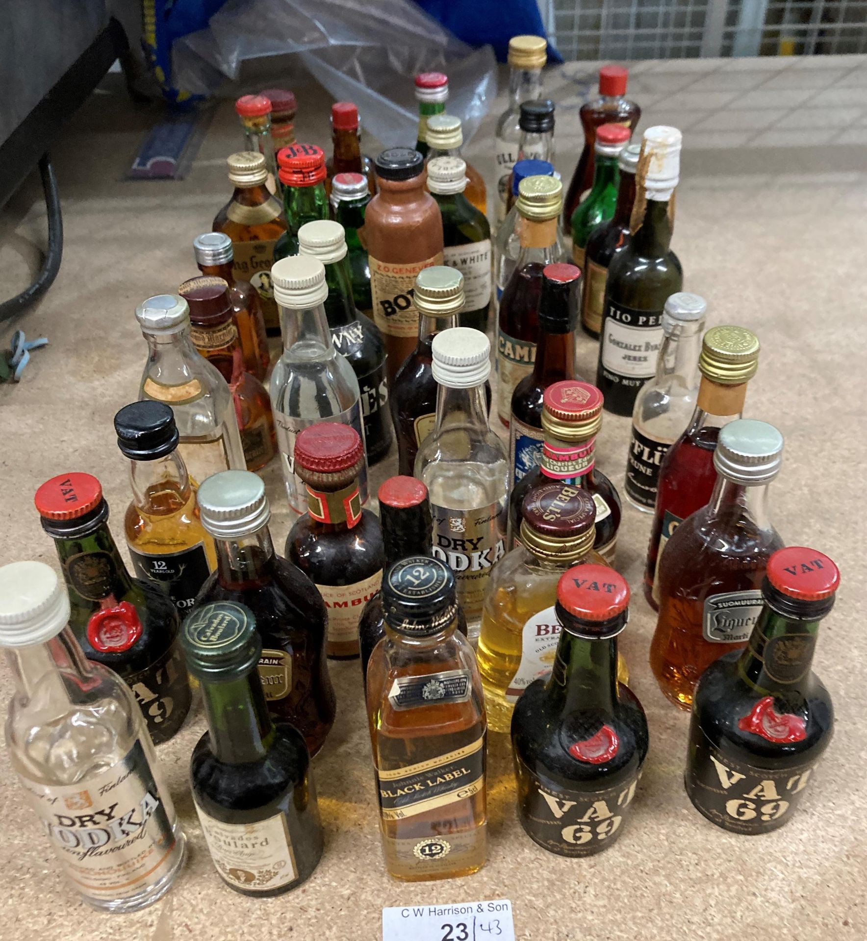 A collection of over forty full and part bottles of miniature spirits and liqueurs (Saleroom