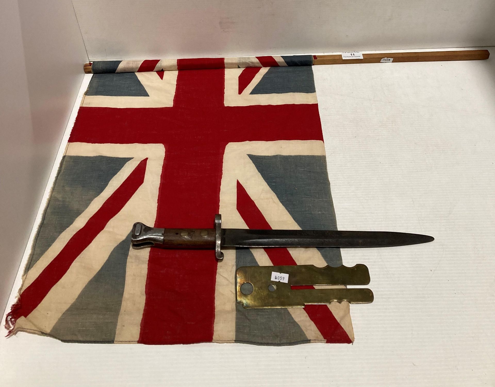 A late 19th Century Lee Metford military bayonet with markings, approximately 41cm long,