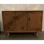 Ercol Windsor sideboard mid century model 366 in solid beech and elm with three doors and one