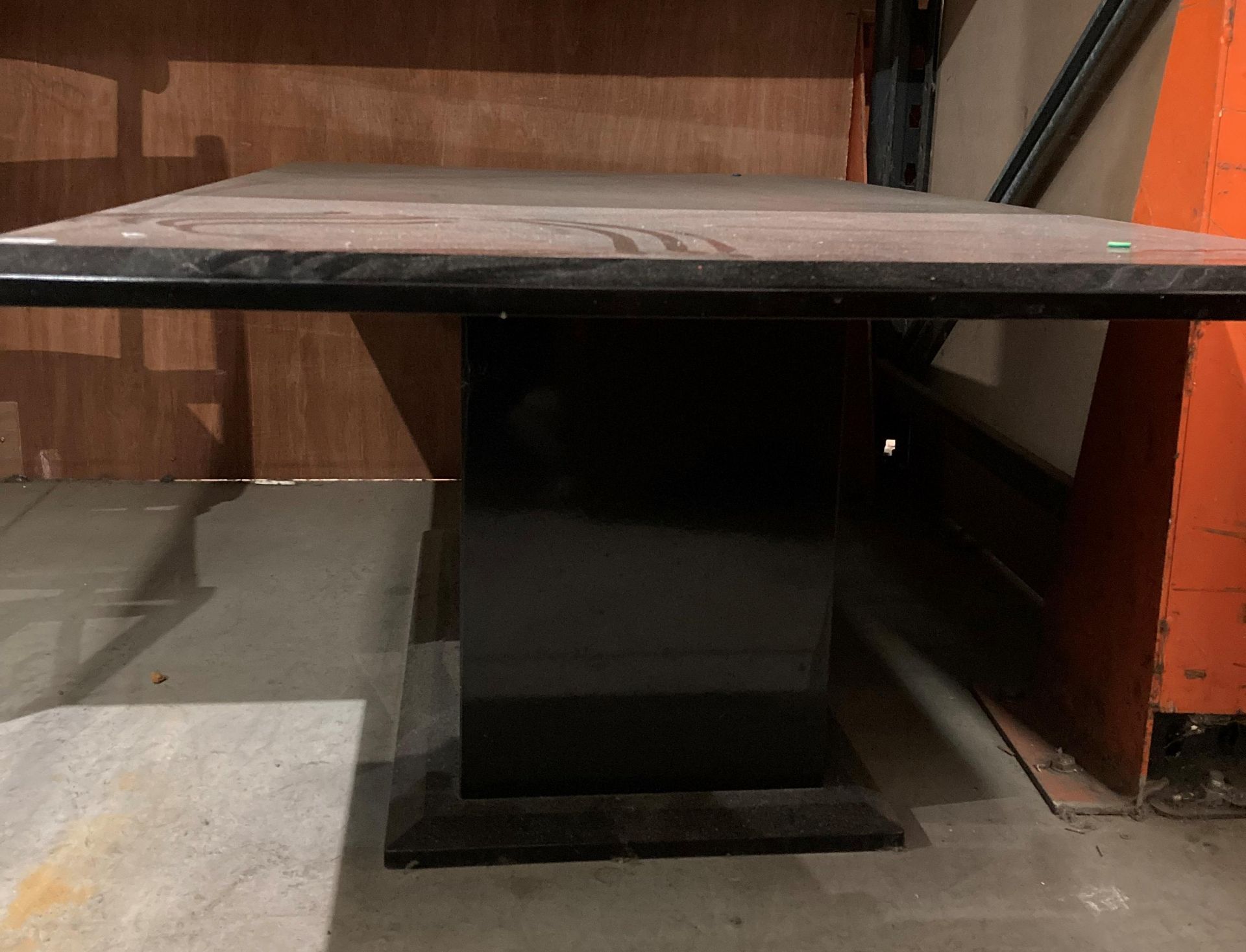 A modern coffee table in a glossy dark walnut finish, - Image 2 of 2