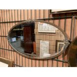 Metal framed oval wall mirror 46 x 80cm (saleroom location: Gallery)