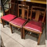A set of three oak dining chairs with red vinyl seats and one other (4) [Please note - the