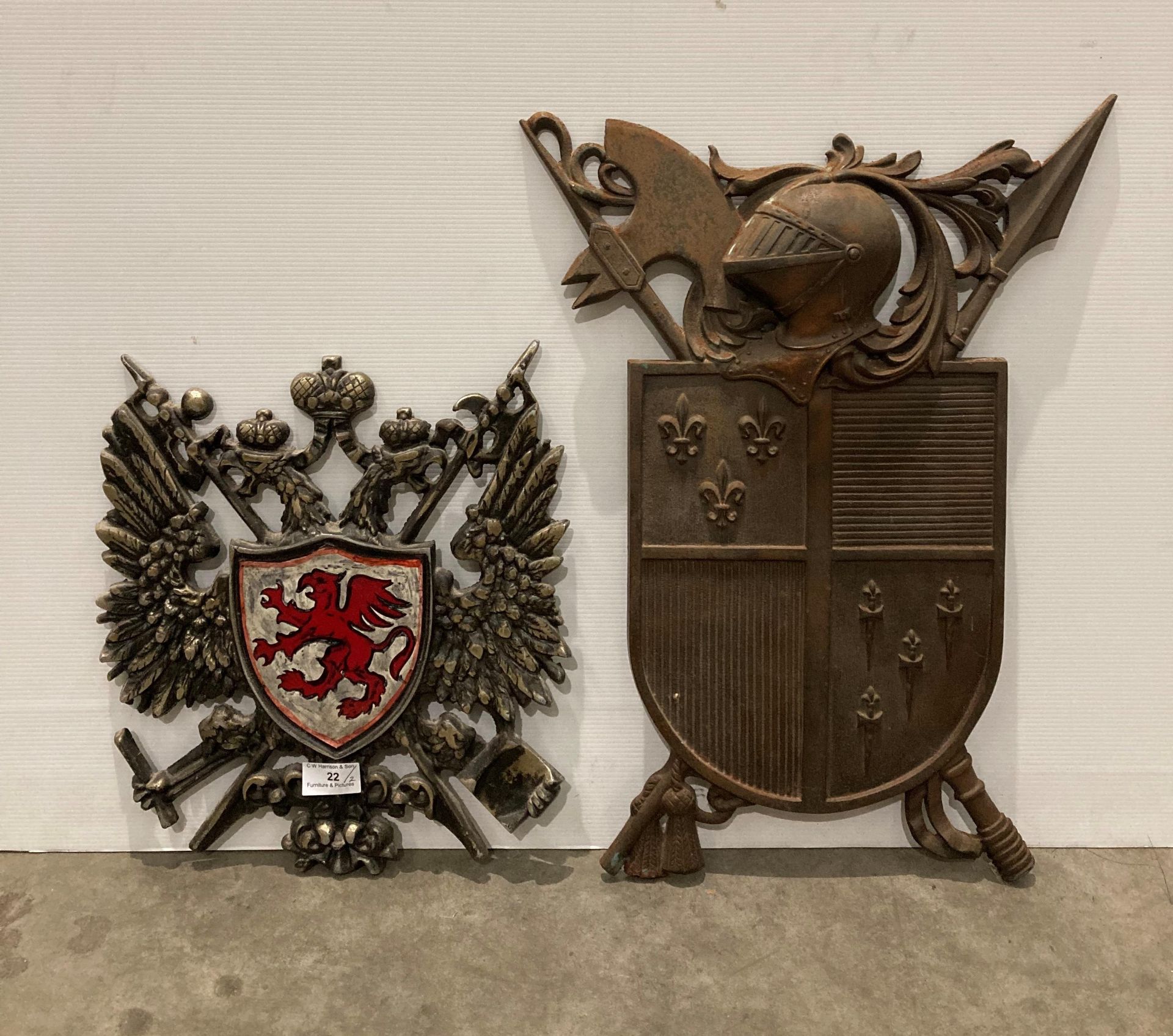 Two Model cast metal coat of arms of Harry Banks B.W.S.
