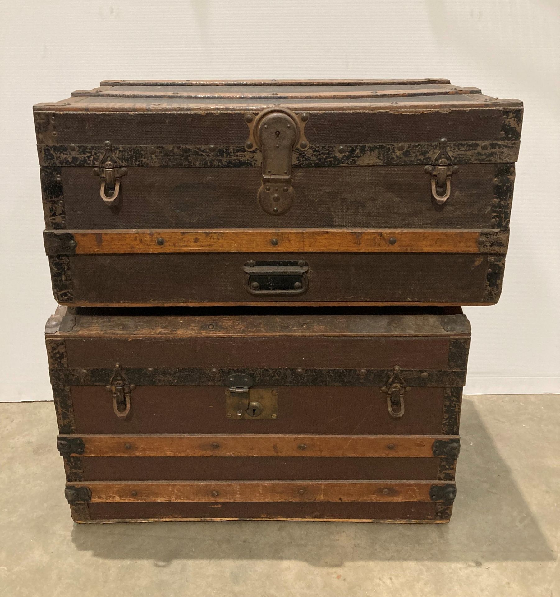 Brown metal and wooden domed top storage trunk, 70 x 41 x 44cm and a similar storage chest,