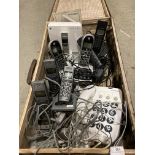Contents to suitcase - a selection of cordless and other phones (saleroom location: W12)