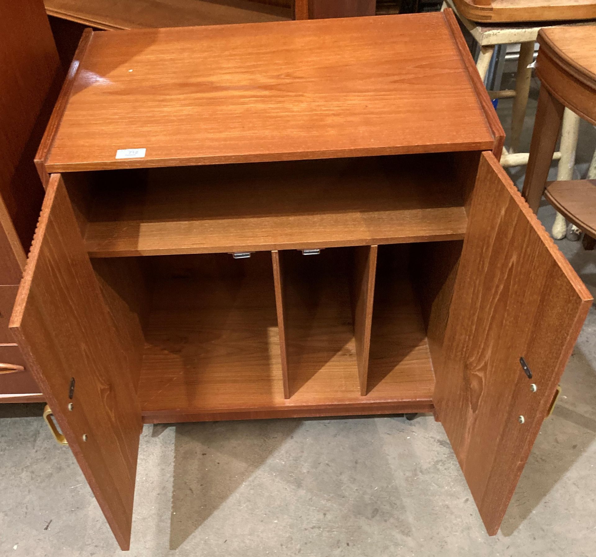 A teak two door mobile record cabinet - 64 x 42 a 69cm high (saleroom location: MS) - Image 2 of 2