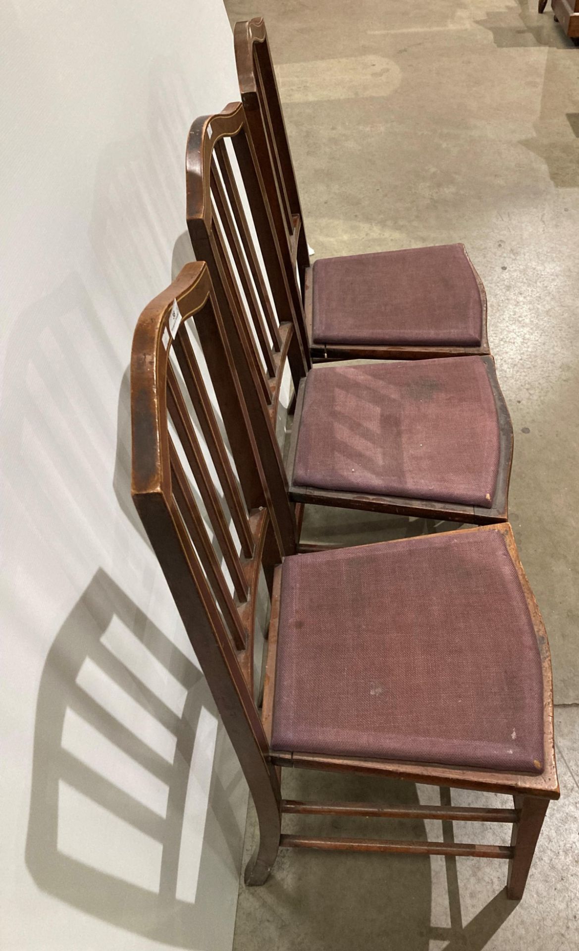 Three mahogany ladder back dining chairs with purple padded seats (saleroom location: kit area) - Image 3 of 3