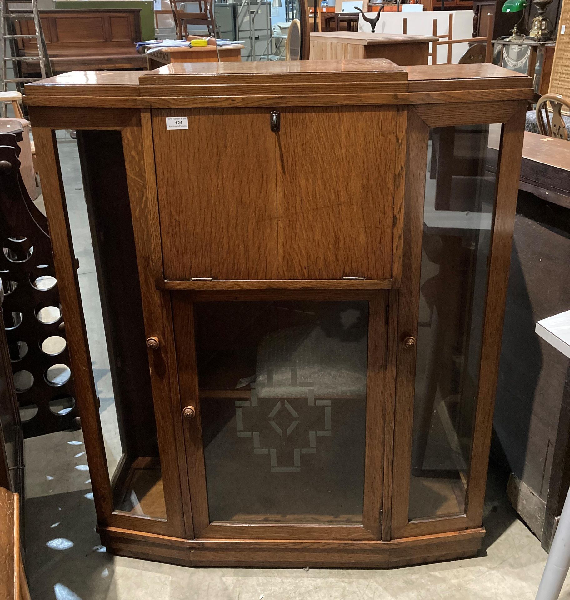 Oak bureau display cabinet with fall front and three glass doors,
