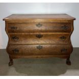 Oak shaped three drawer chest of drawers,