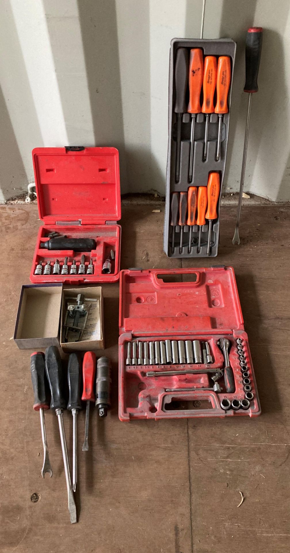 Contents to box - assorted snap-on hand tools including part impact driver set,
