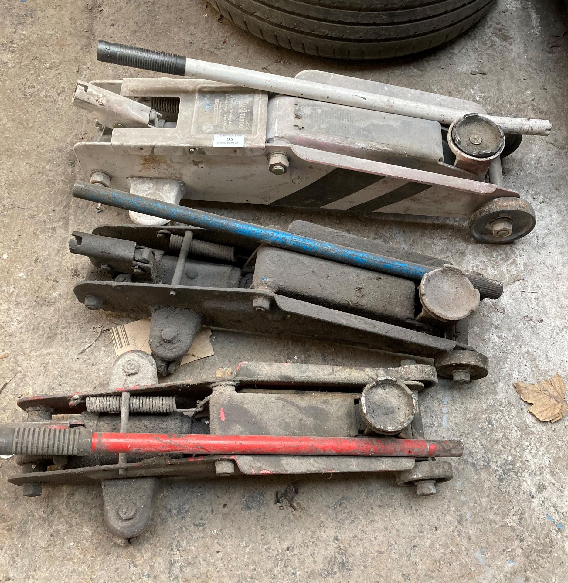 Three assorted trolley jacks