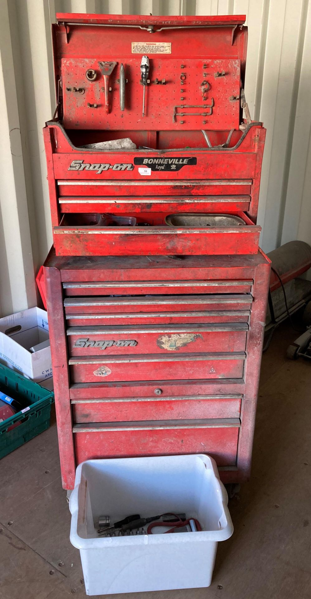 Snap-on two section mobile tool cabinet, top section is a lift top 3 drawer, bottom section,