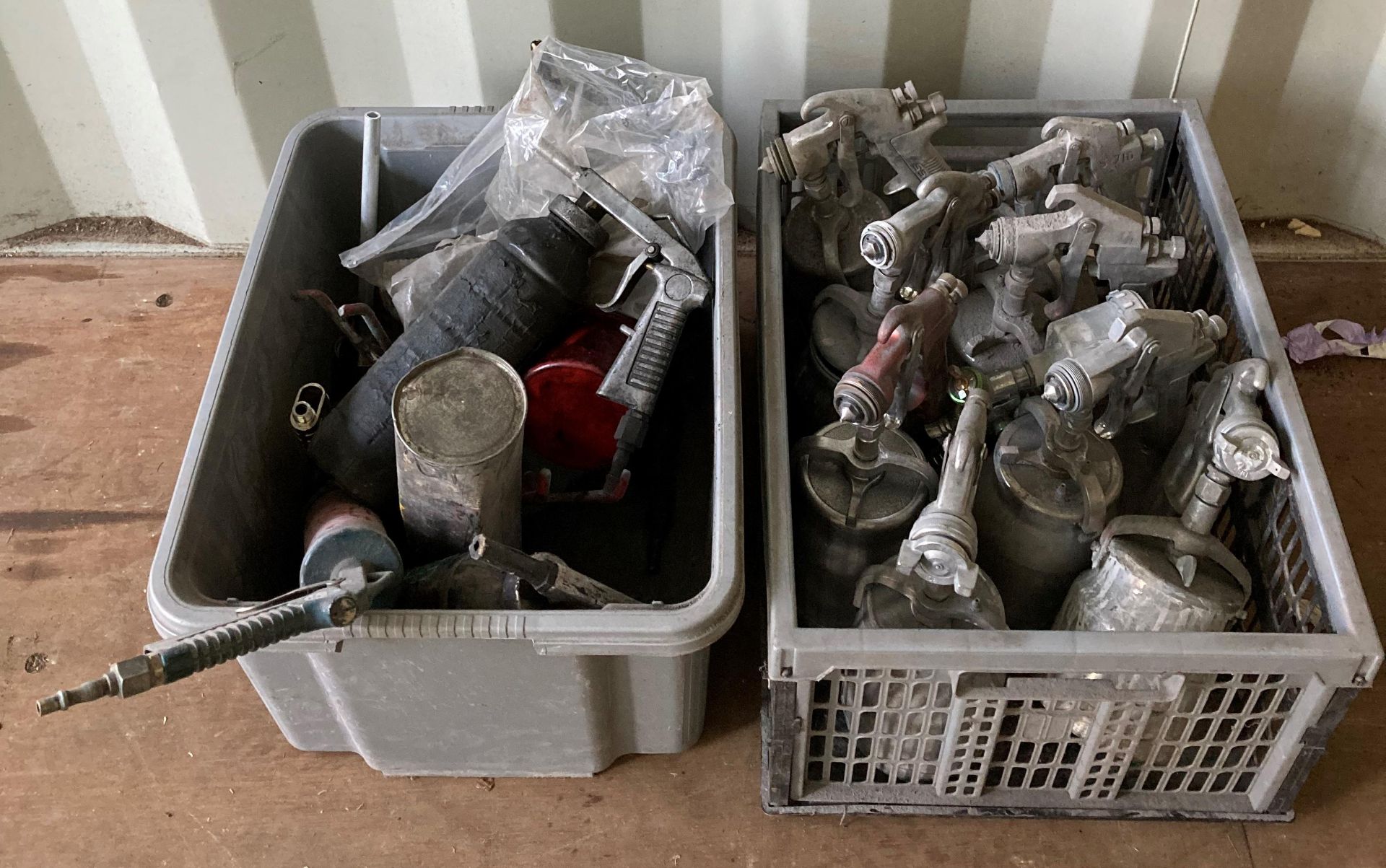 Contents to two boxes - Nine assorted spray guns with pots and assorted gun bodies (Saleroom