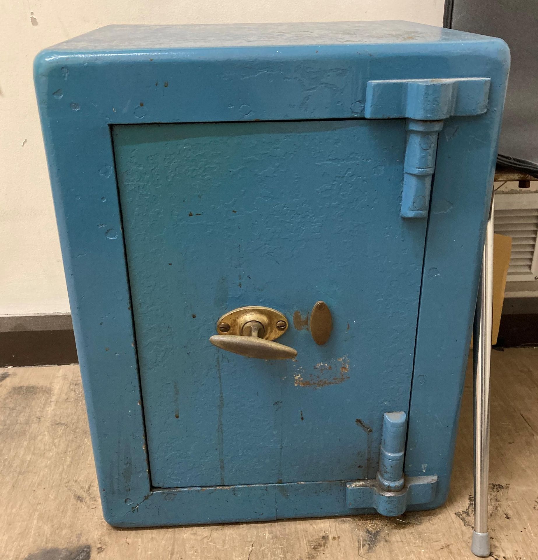 A blue metal office safe, 43cm x 40cm x 56cm, complete with key (Location: 2nd floor,