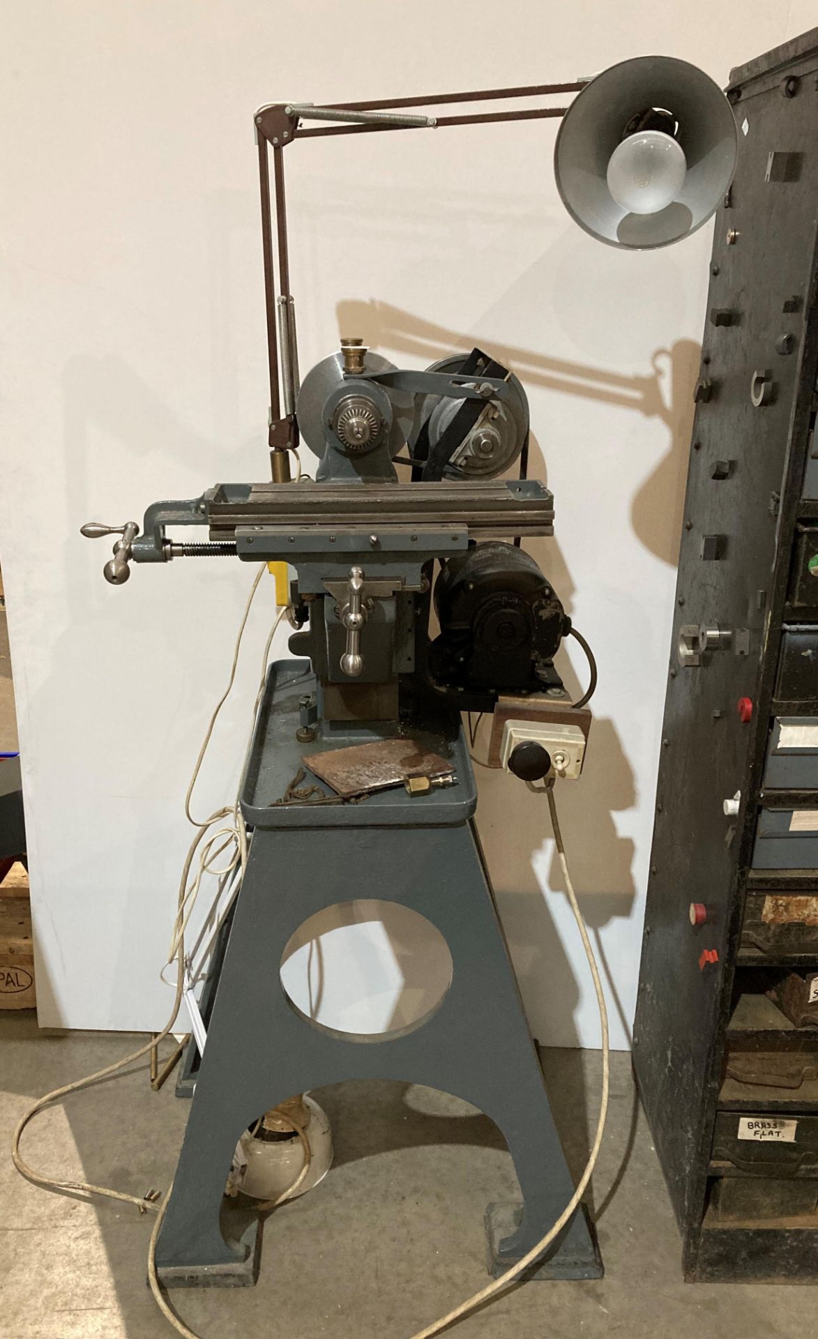 Grey painted vertical milling machine with angle poise lamp (no test - illegal flex cut off)