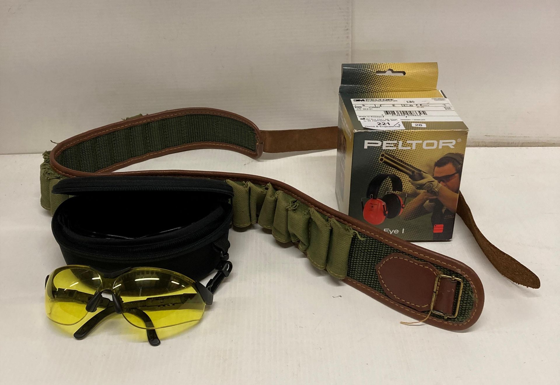 Peltor Bull's Eye 1 ear defenders in box, shotgun cartridge belt (worn),
