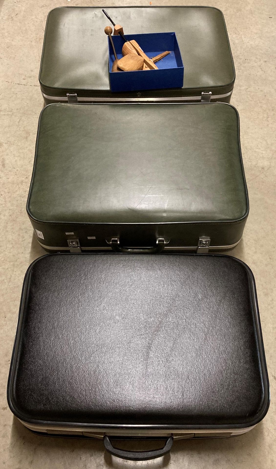 Three assorted suitcases by Antler, etc,