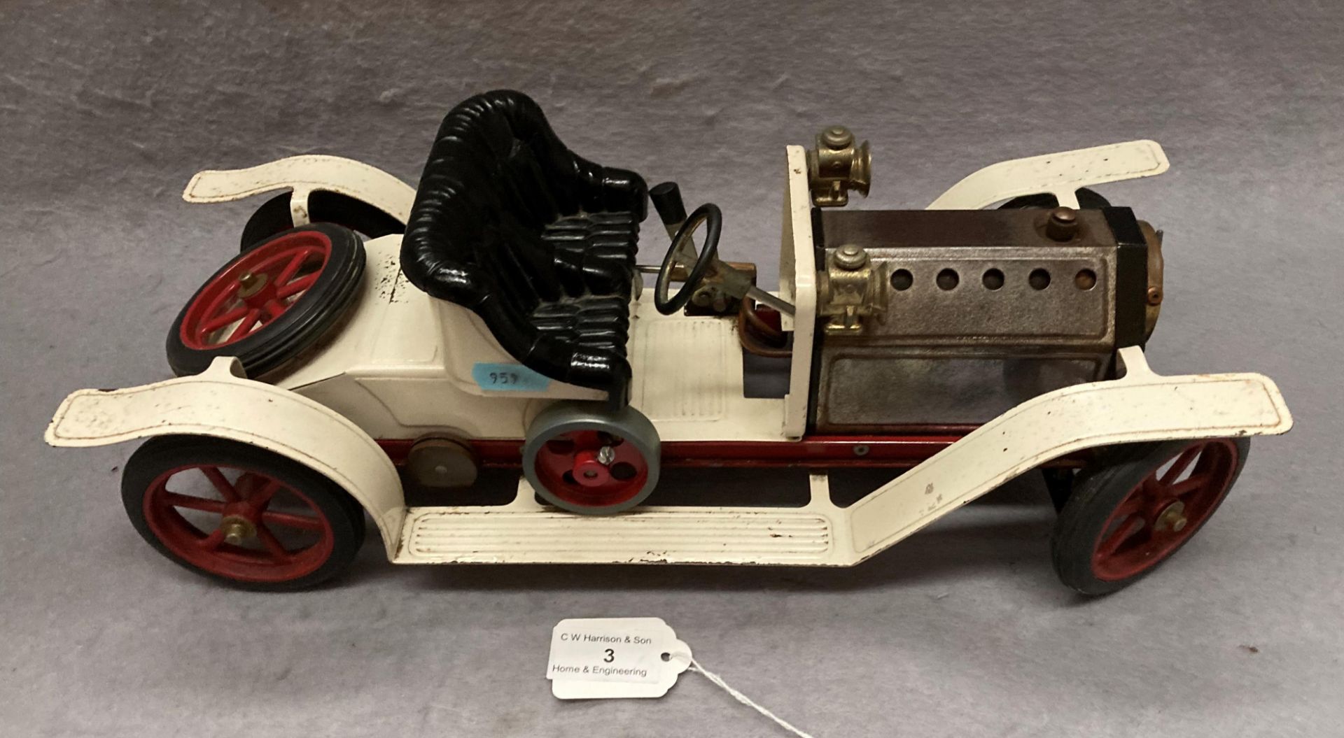 A Mamod scale model steam car, 40cm long,