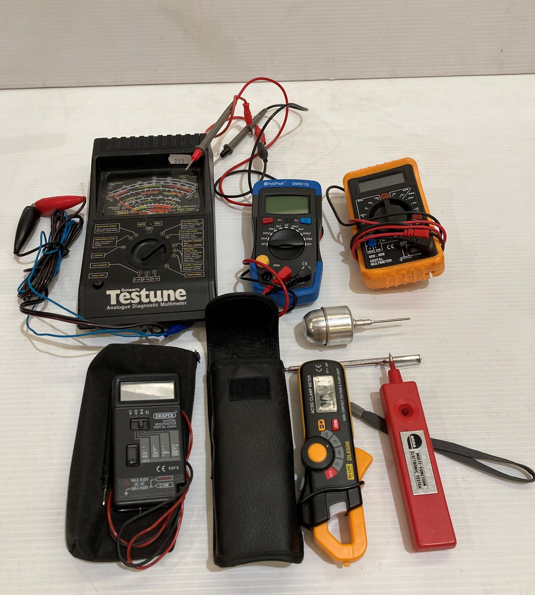 Six assorted electrical testers including AC/DC clamp meter DL6506, 600.