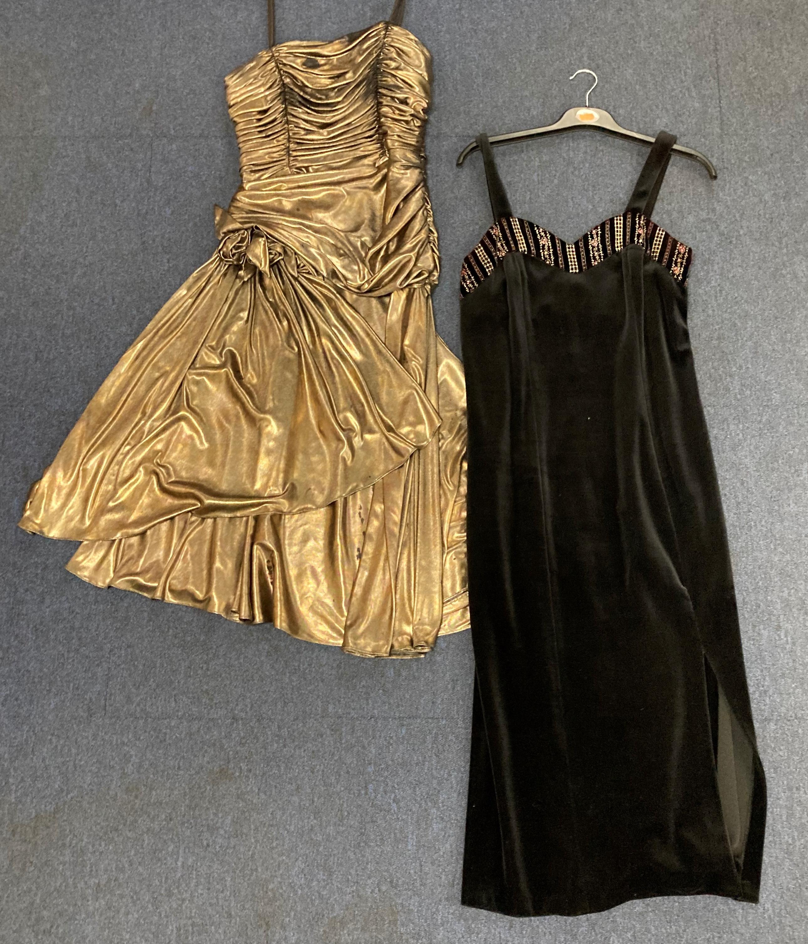 Two vintage dresses -sizes unknown- including one gold-tone waterfall effect dress with fabric