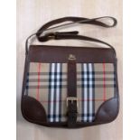 A vintage Burberry shoulder bag with brown leather and iconic Burberry tartan print with gold-tone